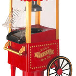 Red popcorn machine with striped roof on a white background