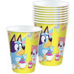 Set of colorful paper cups with cartoon characters on a white background