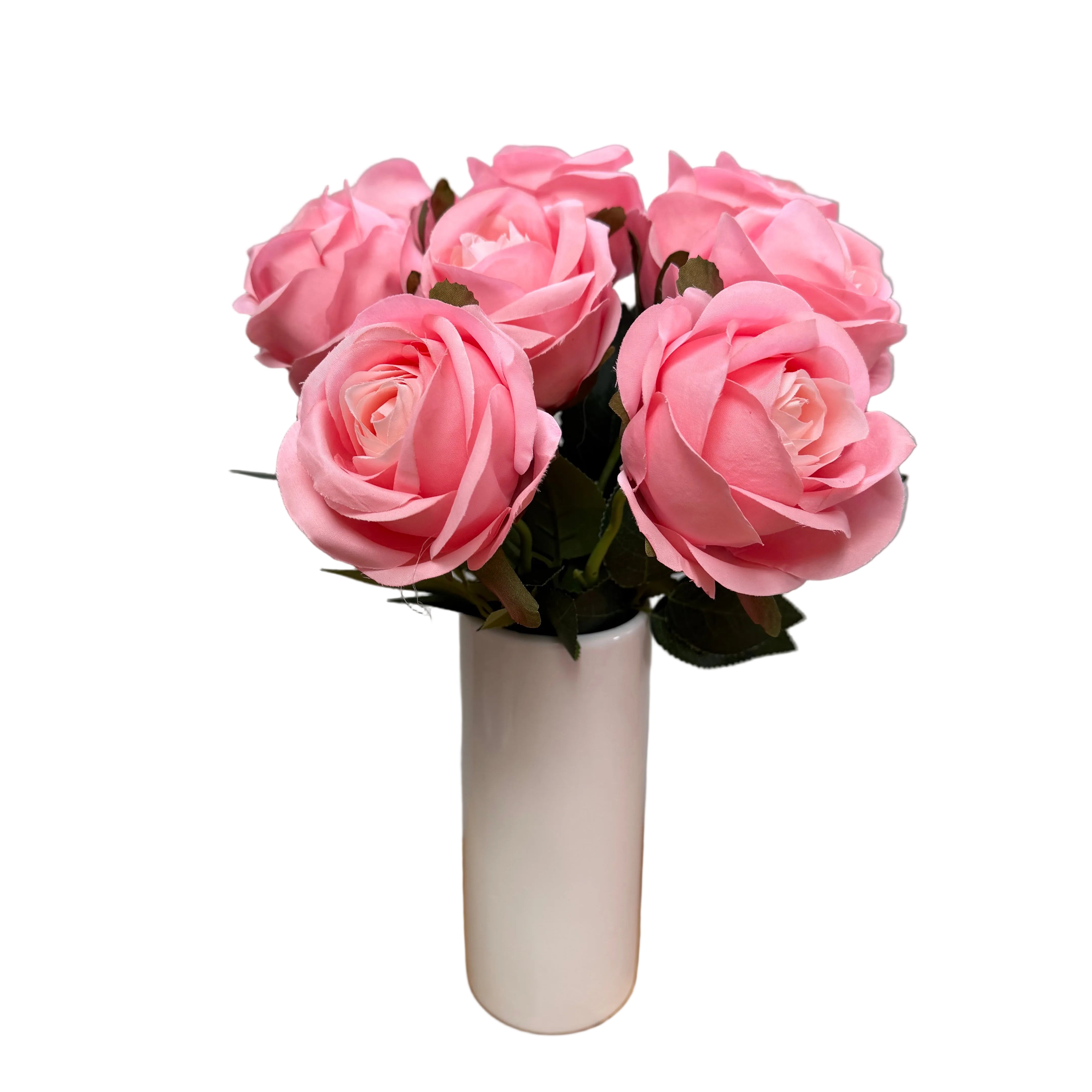 Bouquet of pink flowers on a wooden surface with a gray background