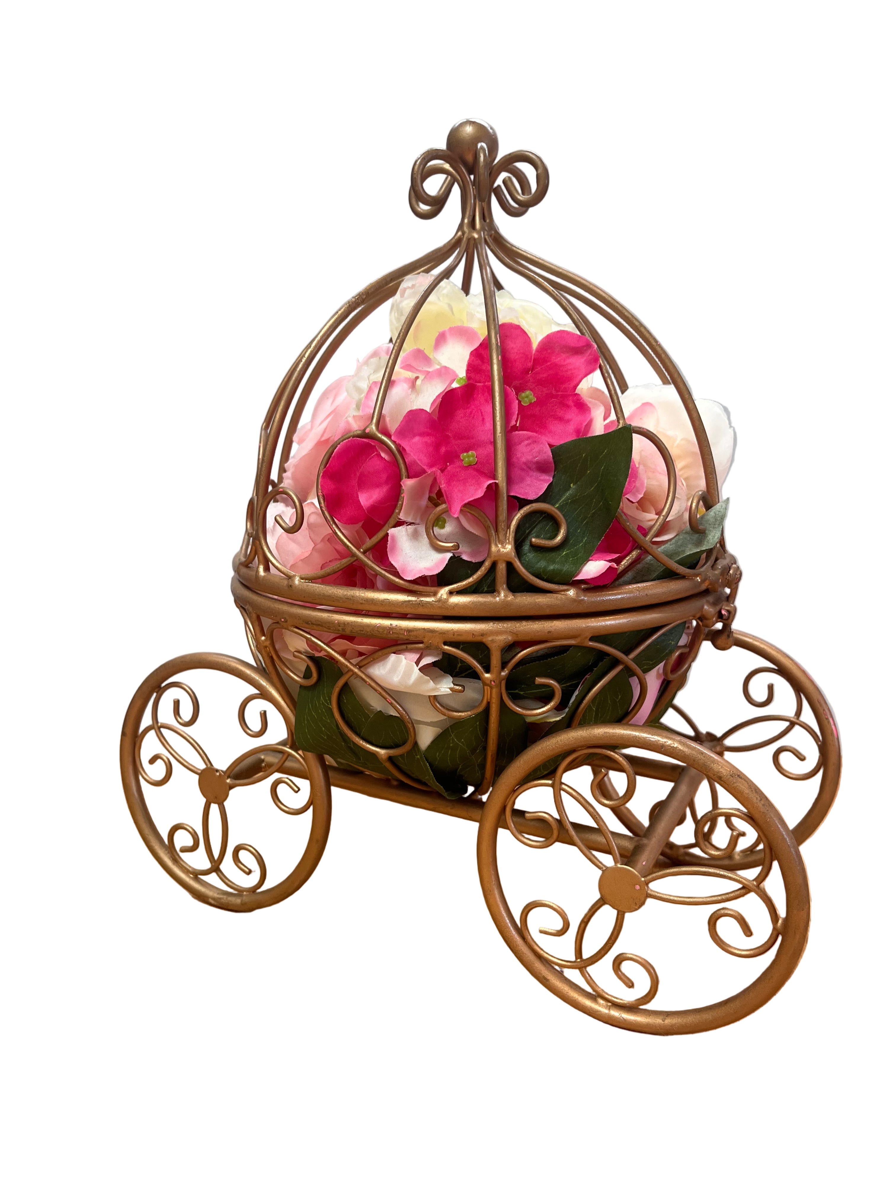 Decorative metal holder with pink flowers on a wooden surface