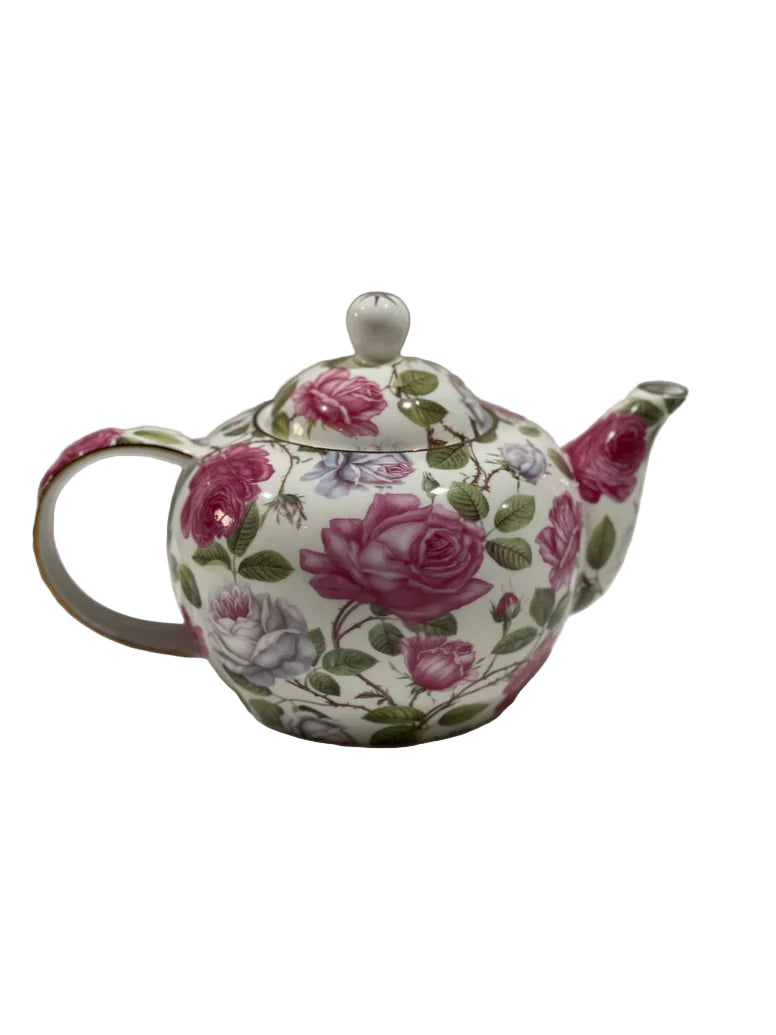 Teapot with floral design on a white background