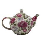 Teapot with floral design on a white background